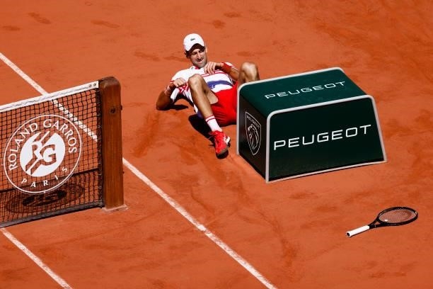 June 2021, France, Paris: Tennis: Grand Slam/ATP Tour - French Open, Singles, Men, Final, Djokovic - Tsitsipas . Novak Djokovic is down. Photo: Frank...