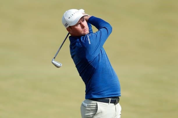 Jonathan Caldwell of Northern Ireland hits his second shot on the 17th hole during the final round of The Scandinavian Mixed Hosted by Henrik and...