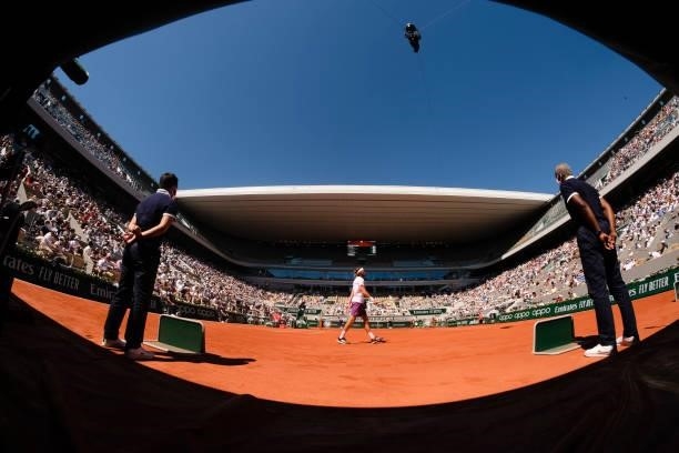 June 2021, France, Paris: Tennis: Grand Slam/ATP Tour - French Open, Singles, Men, Final, Djokovic - Tsitsipas . Spectators sit in the sunshine on...