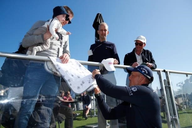 Henrik Stenson of Sweden signs an autograph by the 18th green during the final round of The Scandinavian Mixed Hosted by Henrik and Annika at Vallda...