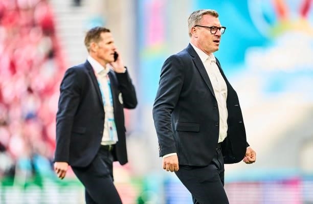 Christian Norkjar, head of danish nationalteams and Peter Moller , director of Danish FA on the pitch during the UEFA EURO 2020 Group B match between...