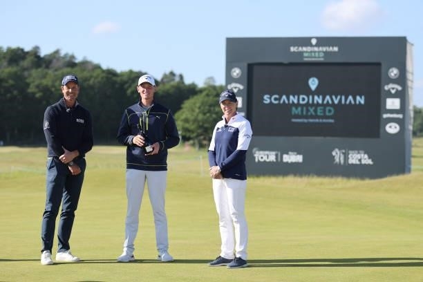 Leading Amateur Vincent Norrman of Sweden poses with Annika Sorenstam and Henrik Stenson of Sweden during the final round of The Scandinavian Mixed...