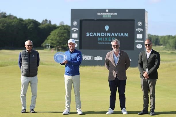 Jonathan Caldwell of Northern Ireland poses with the trophy after his win during the final round of The Scandinavian Mixed Hosted by Henrik and...