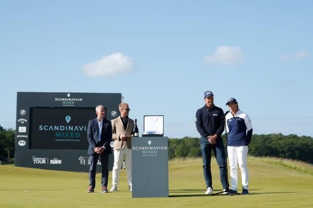 Henrik Stenson of Sweden and Annika Sorenstam of Sweden speak at the trophy presentation during the final round of The Scandinavian Mixed Hosted by...
