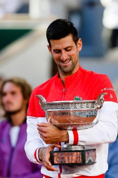 June 2021, France, Paris: Tennis: Grand Slam/ATP Tour - French Open, Singles, Men, Final, Djokovic - Tsitsipas . Novak Djokovic holds the trophy....