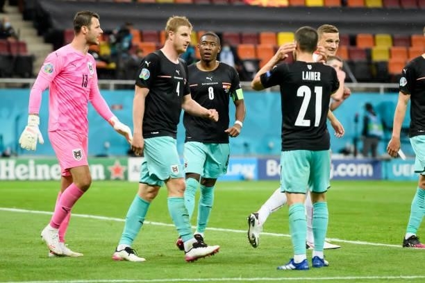 Players of Austria celebrate after the UEFA Euro 2020 Championship Group C match between Austria and North Macedonia at National Arena on June 13,...