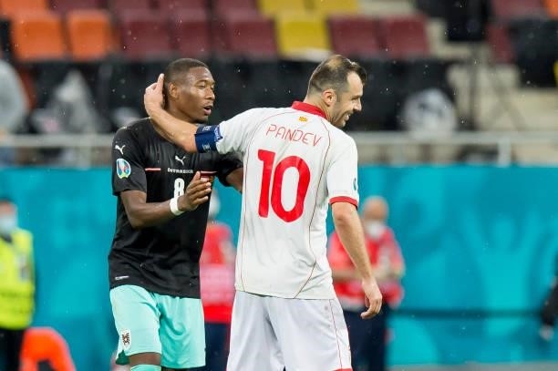 David Alaba of Austria and Goran Pandev of North Macedonia gestures after the UEFA Euro 2020 Championship Group C match between Austria and North...