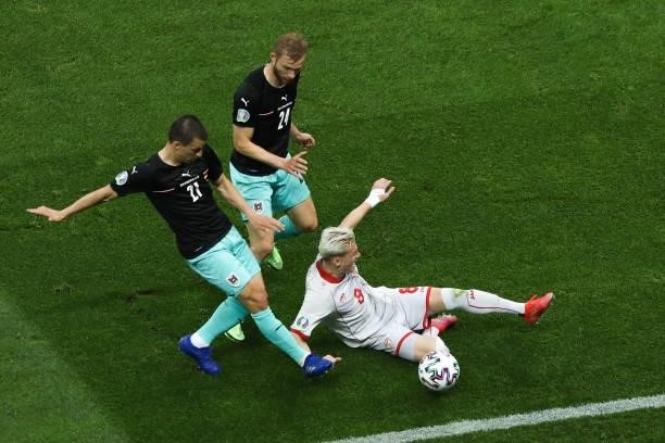 Austria team players and North Macedonia team players during the UEFA Euro 2020 Championship Group C match between Austria and North Macedonia on...