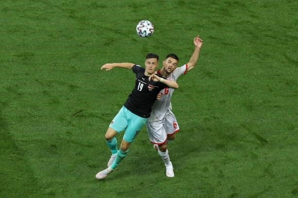 Christoph Baumgartner and Christoph Baumgartner fight for the ball during the UEFA Euro 2020 Championship Group C match between Austria and North...