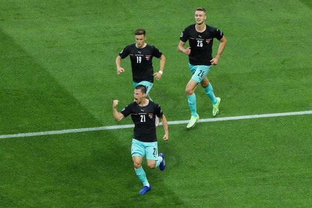 Players of Austria team celebrates the goal during the UEFA Euro 2020 Championship Group C match between Austria and North Macedonia on June 13, 2021...