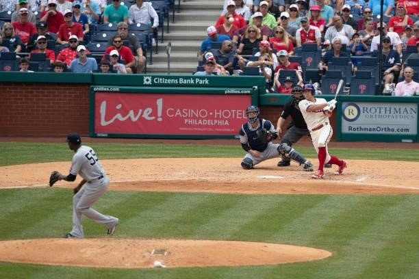 Realmuto of the Philadelphia Phillies hits an RBI single off Domingo German of the New York Yankees in the bottom of the fifth inning at Citizens...