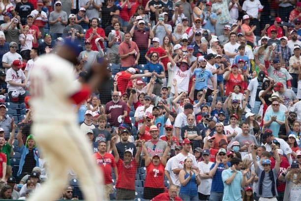 Fans react after Enyel De Los Santos of the Philadelphia Phillies strikes out Gio Urshela of the New York Yankees for the last out of the game at...