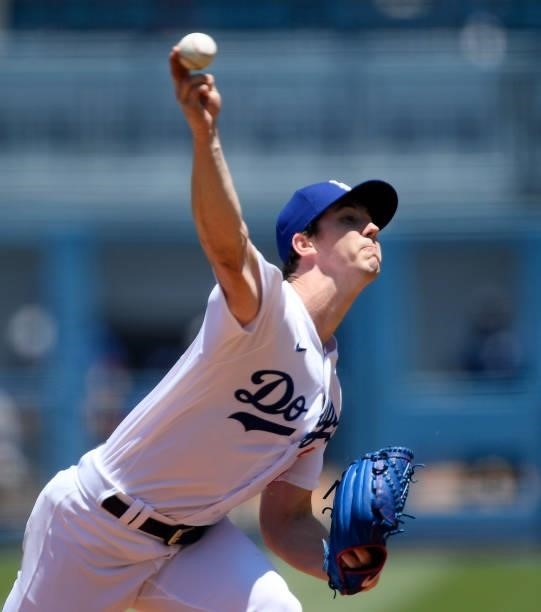 Starting pitcher Walker Buehler of the Los Angeles Dodgers throws against the Texas Rangers during the first inning of their inter-league game at...