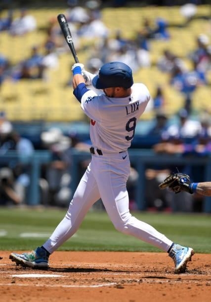 Gavin Lux of the Los Angeles Dodgers hits an one run double to score Mookie Betts of the Los Angeles Dodgers against starting pitcher Dane Dunning of...