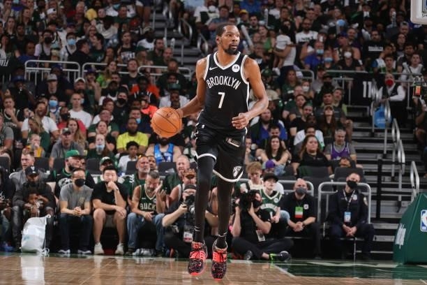 Kevin Durant of the Brooklyn Nets dribbles the ball against the Milwaukee Bucks during Round 2, Game 4 of the 2021 NBA Playoffs on June 13 2021 at...