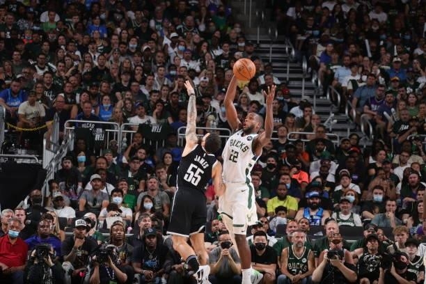 Khris Middleton of the Milwaukee Bucks catches the ball during Round 2, Game 4 of the 2021 NBA Playoffs on June 13 2021 at the Fiserv Forum Center in...