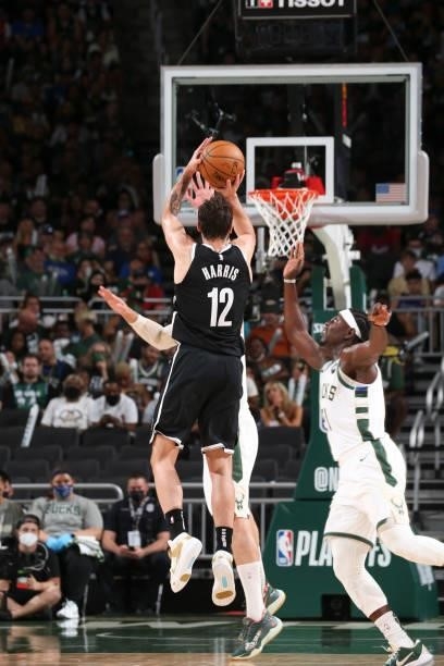 Joe Harris of the Brooklyn Nets shoots a three point basket during the game against the Milwaukee Bucks during Round 2, Game 4 of the 2021 NBA...