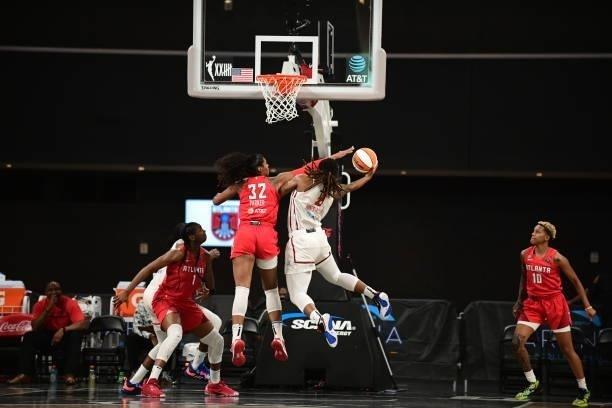 Myisha Hines-Allen of the Washington Mystics drives to the basket against the Atlanta Dream on June 13, 2021 at Gateway Center Arena in College Park,...