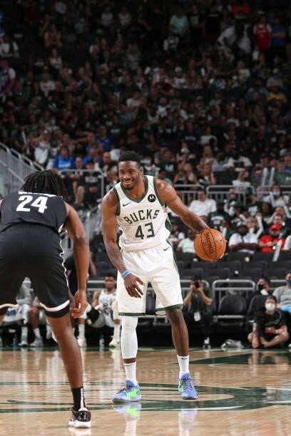 Thanasis Antetokounmpo of the Milwaukee Bucks smiles during the game against the Brooklyn Nets during Round 2, Game 4 of the 2021 NBA Playoffs on...