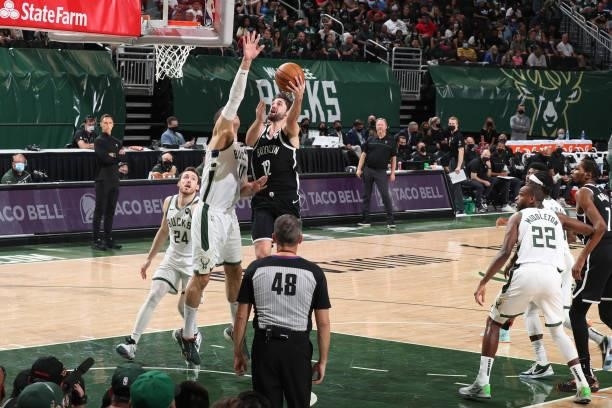 Joe Harris of the Brooklyn Nets drives to the basket against the Milwaukee Bucks during Round 2, Game 4 of the 2021 NBA Playoffs on June 13 2021 at...