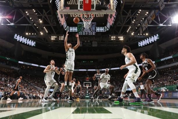 Bryn Forbes of the Milwaukee Bucks rebounds the ball during the game against the Brooklyn Nets during Round 2, Game 4 of the 2021 NBA Playoffs on...