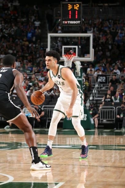 Elijah Bryant of the Milwaukee Bucks handles the ball during the game against the Brooklyn Nets during Round 2, Game 4 of the 2021 NBA Playoffs on...