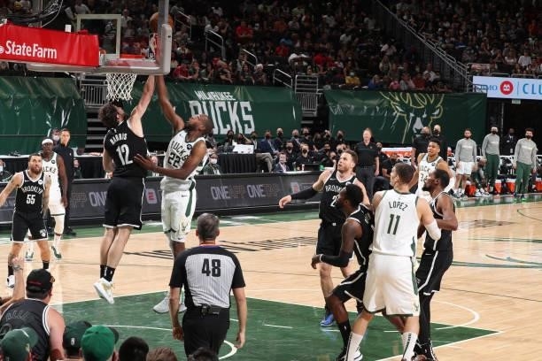 Khris Middleton of the Milwaukee Bucks shoots the ball against the Brooklyn Nets during Round 2, Game 4 of the 2021 NBA Playoffs on June 13 2021 at...