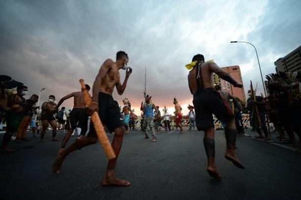 Indigenous people protest the start of Copa America and against President Jair Bolsonaro on June 13, 2021 in Brasilia, Brazil. Brazil, through...