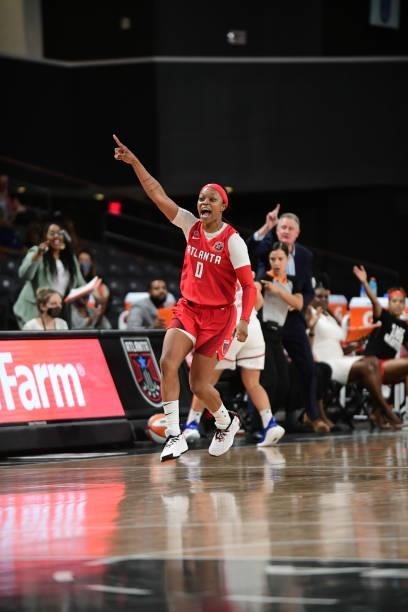 Odyssey Sims of the Atlanta Dream celebrates during the game against the Washington Mystics on June 13, 2021 at Gateway Center Arena in College Park,...