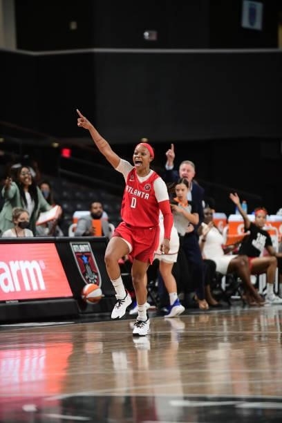 Odyssey Sims of the Atlanta Dream celebrates during the game against the Washington Mystics on June 13, 2021 at Gateway Center Arena in College Park,...