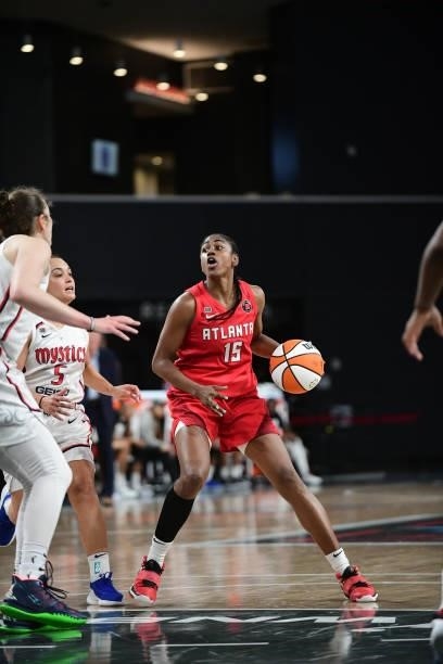 Tiffany Hayes of the Atlanta Dream looks to pass against the Washington Mystics on June 13, 2021 at Gateway Center Arena in College Park, Georgia....