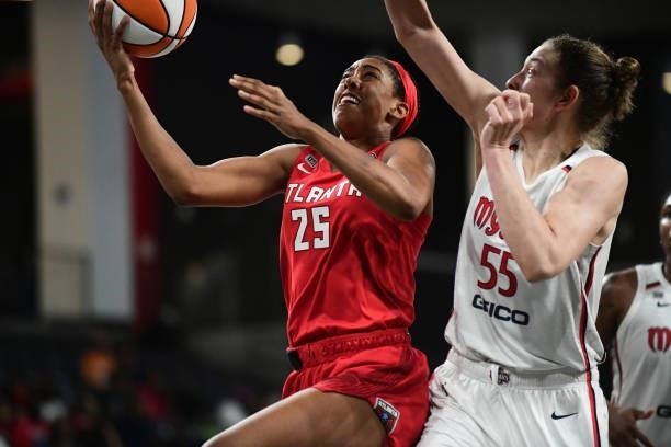 Monique Billings of the Atlanta Dream drives to the basket against the Washington Mystics on June 13, 2021 at Gateway Center Arena in College Park,...