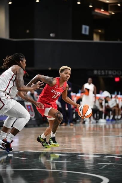 Courtney Williams of the Atlanta Dream drives to the basket against the Washington Mystics on June 13, 2021 at Gateway Center Arena in College Park,...
