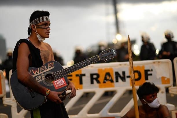 Indigenous people protest the start of Copa America and against President Jair Bolsonaro on June 13, 2021 in Brasilia, Brazil. Brazil, through...