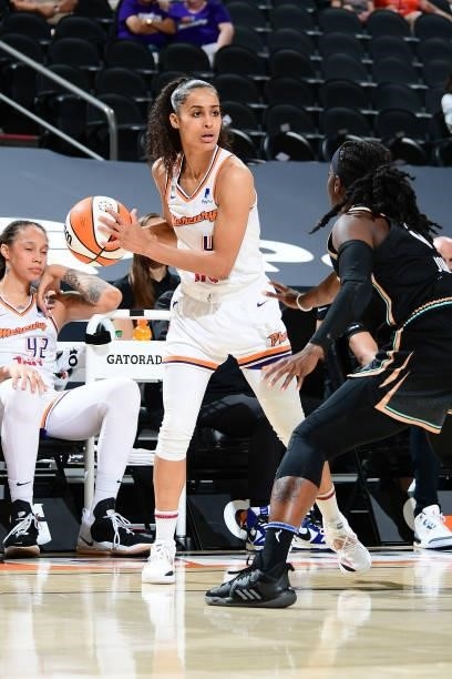 Skylar Diggins-Smith of the Phoenix Mercury looks to pass the ball against the New York Liberty on June 13, 2021 at Phoenix Suns Arena in Phoenix,...