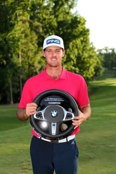 Mito Pereira of Chile holds the championship trophy after winning the BMW Charity Pro-Am presented by Synnex Corporation at the Thornblade Club on...