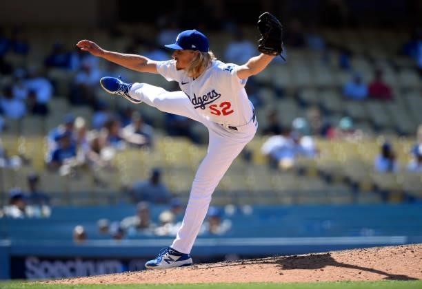Relief pitcher Phil Bickford of the Los Angeles Dodgers follows thru on pitch against the Texas Rangers during the ninth inning of a inter-league...