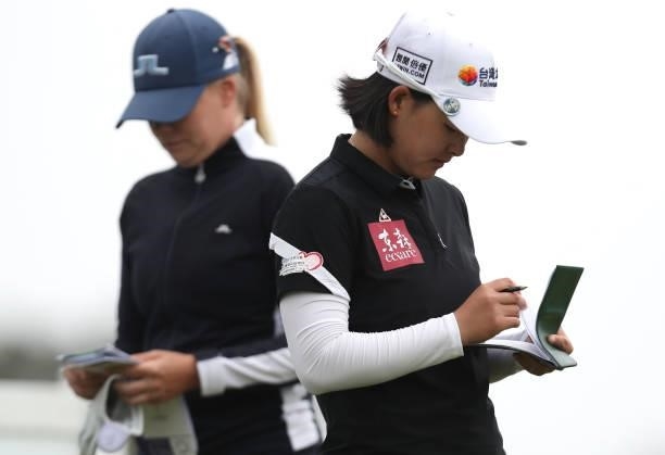Min Lee of Chinese Taipei and Matilda Castren of Finland wait to hit on the 12th hole during the final round of the LPGA Mediheal Championship at...