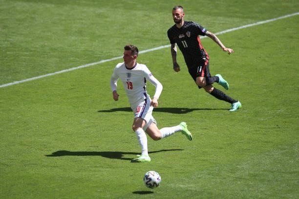 Mason Mount of England in action with Marcelo Brozovic of Croatia during the UEFA Euro 2020 Championship Group D match between England and Croatia on...
