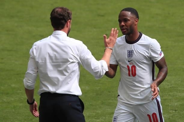 Gareth Southgate, Head Coach of England with Raheem Sterling during the UEFA Euro 2020 Championship Group D match between England and Croatia on June...