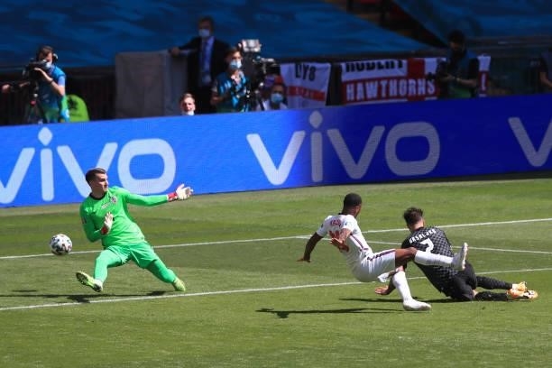 Raheem Sterling of England scores the wining goal during the UEFA Euro 2020 Championship Group D match between England and Croatia on June 13, 2021...