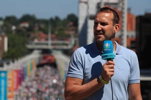 Mark Schwarzer is seen working for Australian broadcaster Optus Sport during the UEFA Euro 2020 Championship Group D match between England and...