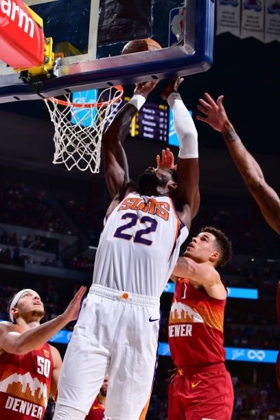 Deandre Ayton of the Phoenix Suns shoots the ball against the Denver Nuggets during Round 2, Game 4 of the 2021 NBA Playoffs on June 13, 2021 at the...