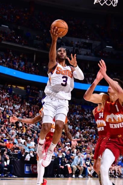 Chris Paul of the Phoenix Suns shoots the ball against the Denver Nuggets during Round 2, Game 4 of the 2021 NBA Playoffs on June 13, 2021 at the...