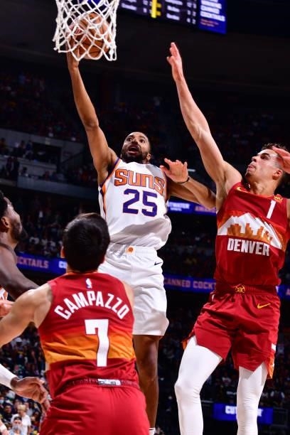 Mikal Bridges of the Phoenix Suns shoots the ball against the Denver Nuggets during Round 2, Game 4 of the 2021 NBA Playoffs on June 13, 2021 at the...