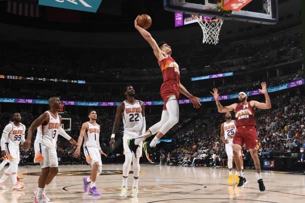 Michael Porter Jr. #1 of the Denver Nuggets dunks the ball during the game against the Phoenix Suns during Round 2, Game 4 of the 2021 NBA Playoffs...