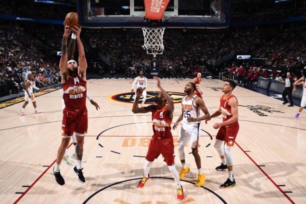 JaVale McGee of the Denver Nuggets grabs a rebound during the game against the Phoenix Suns during Round 2, Game 4 of the 2021 NBA Playoffs on June...