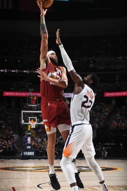 JaVale McGee of the Denver Nuggets drives to the basket during the game against the Phoenix Suns during Round 2, Game 4 of the 2021 NBA Playoffs on...