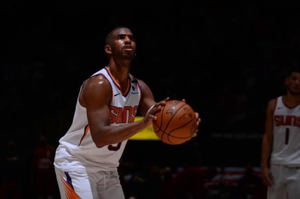 Chris Paul of the Phoenix Suns shoots a free throw against the Denver Nuggets during Round 2, Game 4 of the 2021 NBA Playoffs on June 13, 2021 at the...