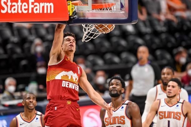Michael Porter Jr. #1 of the Denver Nuggets scores on a slam dunk against the Phoenix Suns in Game Four of the Western Conference second-round...